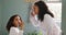 Mother, girl and brushing teeth in the bathroom in a hygiene or grooming morning routine. Family home, dental care and