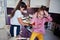 Mother with girl cooking at kitchen, happy children`s moments