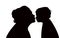 A mother  giving kiss to her son, silhouette vector