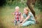 Mother going for a walk with her little son