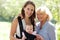 Mother and grandmother smiling with baby