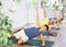 Mother, grandmother and teen son do Vasishthasana, side plank pose