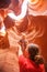 Mother and her baby son visit Lower Antelope canyon in Arizona