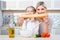 Mother and her daughter cooking in the kitchen