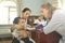 Mother and her little child at a reception with a female pediatrician doctor