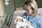 Mother with her newborn baby at the hospital a day after a natural birth labor