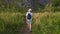 Mother and her son walking in the Altai mountains