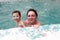 Mother and her son in winter pool