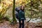 Mother Hiking with Baby in Backpack Carrier in Canadian Nature.