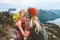 Mother hiking with daughter in Norway mountains travel together family time healthy lifestyle active vacations