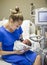 Mother holding her newborn premature baby in the hospital