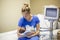 Mother holding her newborn premature baby in the hospital