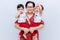 Mother holding two baby Boys. Great happiness, happy young mom with two twins baby. Portrait of young mother holding her little tw