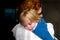 Mother holds sleeping child closeup isolated