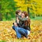 Mother hugging child - outdoor portrait