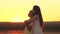 mother hugs and regrets her daughter against the backdrop of the sunset sky, love children, difficult age of teenager