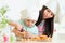 Mother and kid girl making cookies