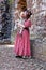 Mother and kid wearing pseudo-Victorian costumes at Raglan Castle - South Wales
