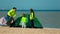 Mother with kids preparing a tent on the beach for families.