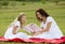 Mother and kids reading a book