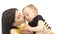 Mother kisses her baby, he laughs. White background. Slow motion