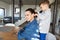 Mother lets her son comb her hair