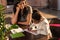 Mother looking at cute little daughter doing homework, homework help concept