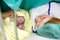 Mother looking for first time her baby being born via Caesarean Section
