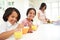 Mother Making School Packed Lunches For Children