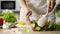 Mother mixing salad in glass bowl by big wooden spoon, traditional family recipe