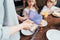 mother packing school lunch in box