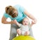 Mother playing with baby on fitness ball