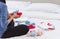 Mother preparing baby clothes resting and relaxing on the bed