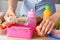 Mother preparing lunch box