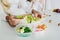 Mother preparing sandwich school lunch table close up