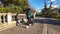 Mother pushing Stroller with Baby on Seawall. Stanley Park. Sunny, Fall Season. Downtown Vancouver