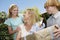 Mother Receiving Gift From Children Outdoors