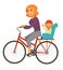 Mother rides bicycle with baby boy on special seat