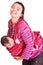 Mother rocks baby to sleep in sling