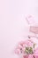 Mother`s Day, Valentine`s Day background design concept, beautiful pink carnation flower bouquet on pastel pink table, top view,