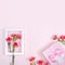 Mother`s Day, Valentine`s Day background design concept, beautiful pink, red carnation flower bouquet on pink table, top view,