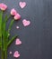 Mother`s Day, woman`s day. tulips on wooden background