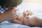 Mother`s love tenderness hands kiss newborn baby