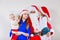 Mother, Santa and two daughters christmas family photo