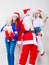 Mother, Santa and two daughters christmas family photo