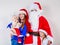 Mother, Santa and two daughters christmas family photo