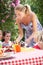 Mother Serving Birthday Cake To Group Of Children