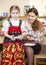 Mother and small daughter in Russian traditional sarafan