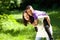 Mother smiling outdoors with happy son