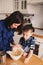 Mother and son baking cake in the kitchen. Lifestyle casual capture of family cooking